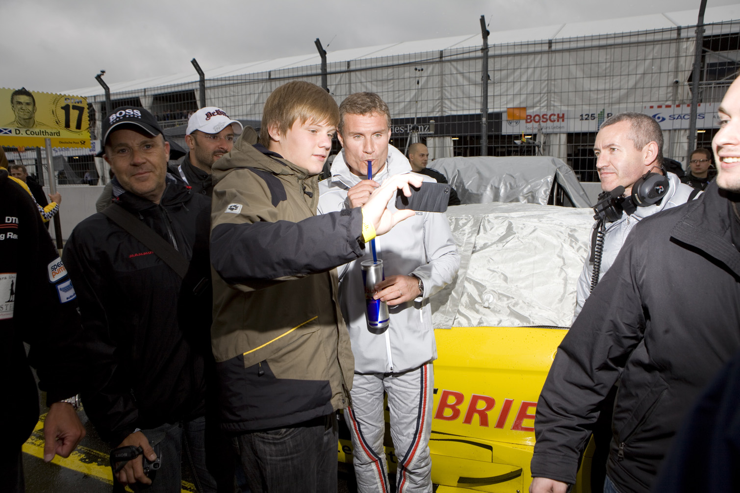 A fan photographs himself and David Coulthard