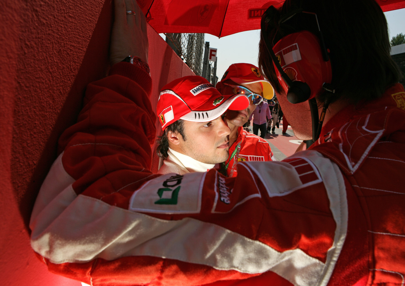 Felipe Massa talks to his team on the starting grid before the French Grand Prix 2007