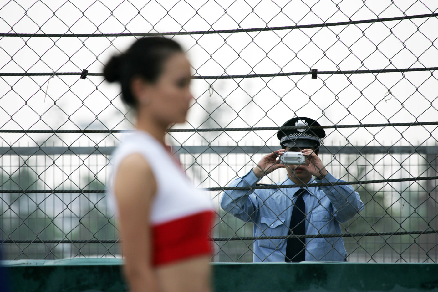 A Japanese policeman investigates the grid girls