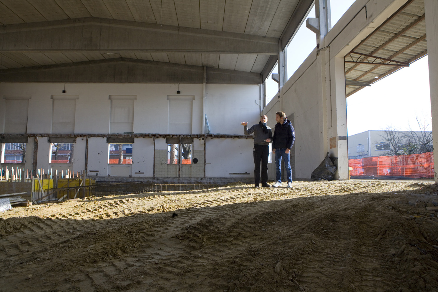 Franz Tost shows Jean-Eric Vergne around the site of the newest part of the Toro Rosso factory