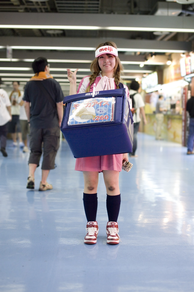 Girls selling beers and snacks at the Tokyo Dome, home of the Yomiuri Giants baseball team.