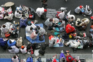 Fans sheltering from the rain at the Japanese Grand Prix