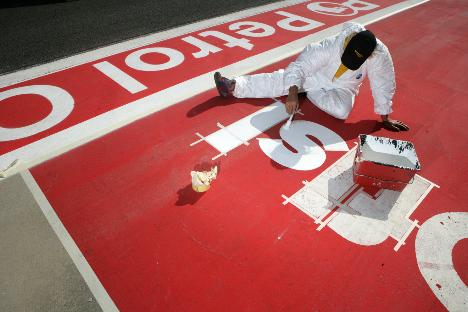 Preparing the track advertising for the Bahrain Grand Prix