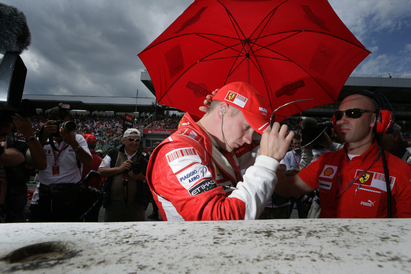 Kimi Räikkönen gets ready for action, at the German Grand Prix 2008