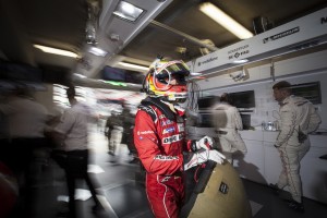 Timo Bernhard rushes through the garage